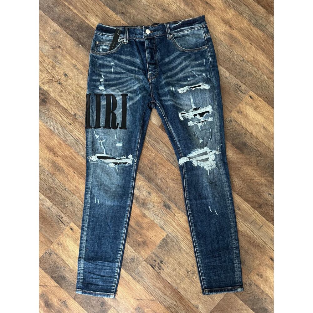 Amiri denim jeans with Amiri Logo on right side